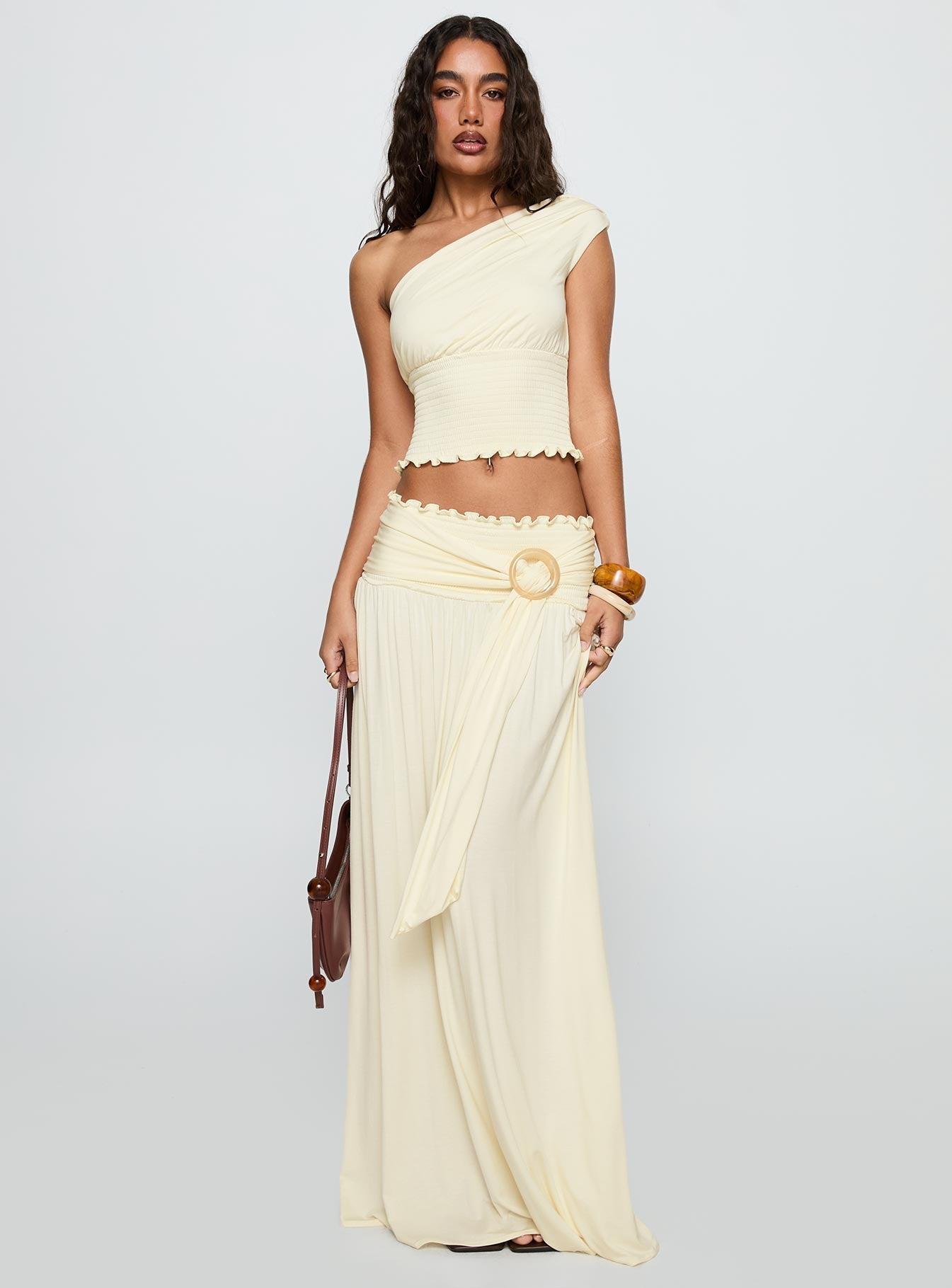  front view of model wearing Princess Polly Full Orbit Shirred Maxi Skirt Cream Maxi 