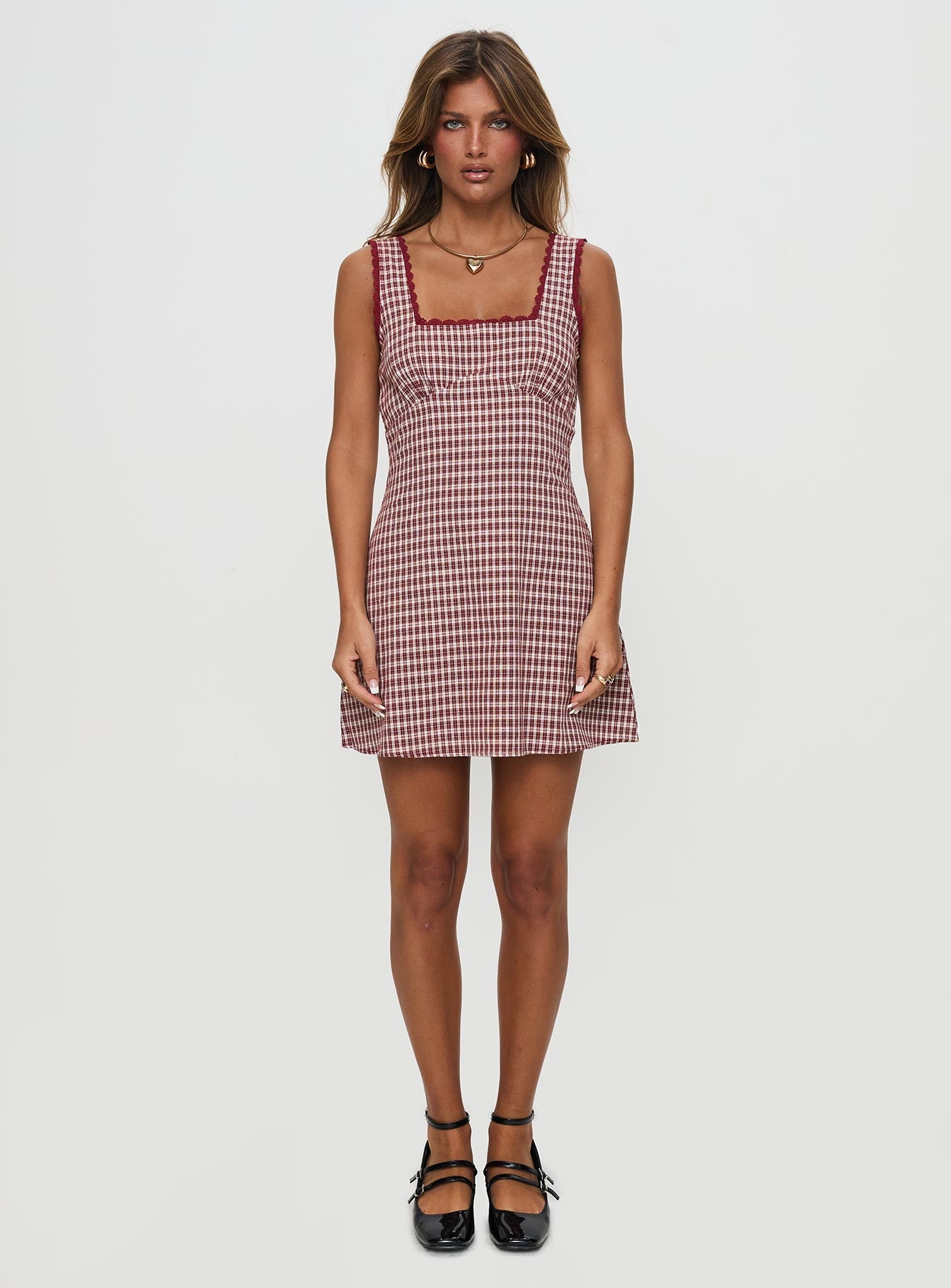 side view of model wearing Princess Polly Dasha Mini Dress Red Check Square Neck 