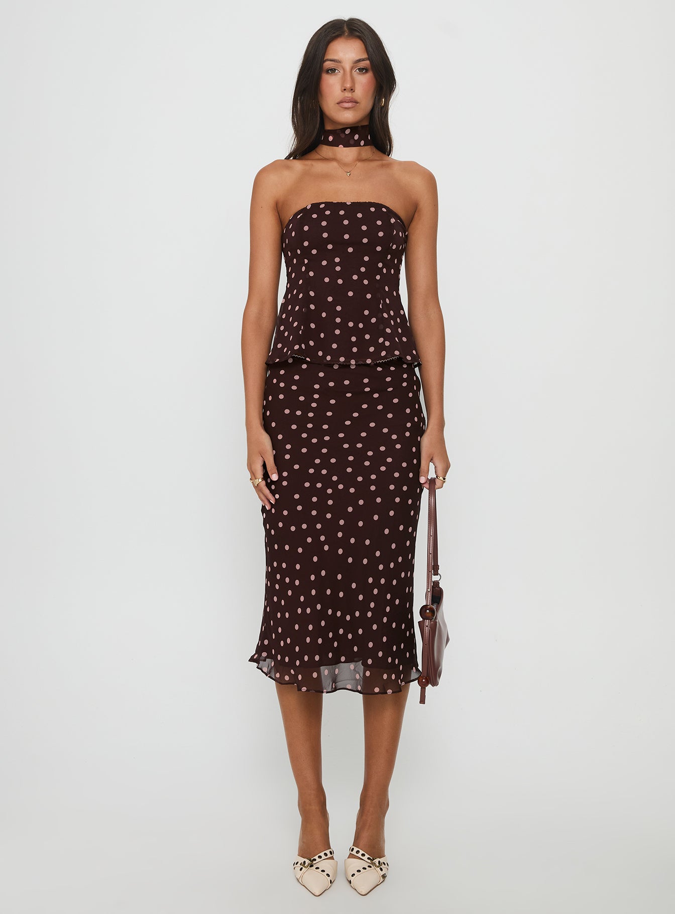   front view of model wearing Princess Polly Sydni Midi Bias Cut Skirt Chocolate / Pink Polka Midi Skirts 