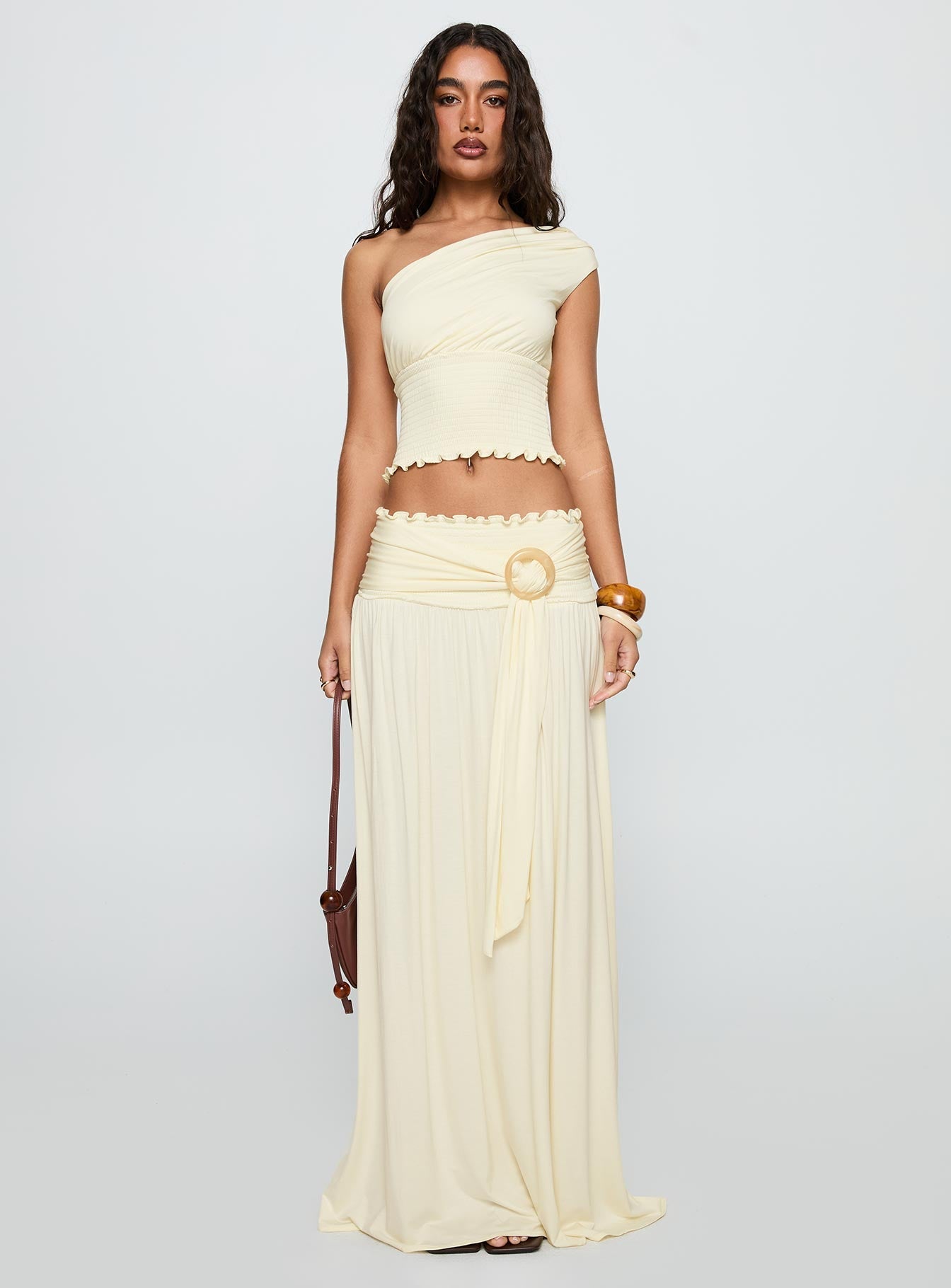   front view of model wearing Princess Polly Full Orbit Shirred Maxi Skirt Cream Maxi 